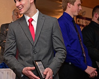 BOARDMAN, OHIO - JANUARY 29, 2017: Nick Hall of Girard smiles after finding out he won the Student Athlete of the Year Scholarship, Sunday evening at the Georgetown. DAVID DERMER | THE VINDICATOR