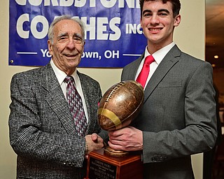 BOARDMAN, OHIO - JANUARY 29, 2017: Nick Hall of Girard poses for a picture with Banquet Chairman Sam Rogers after winning the Student Athlete of the Year Scholarship, Sunday evening at the Georgetown. DAVID DERMER | THE VINDICATOR