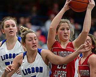 LISBON, OHIO - JANUARY 30, 2017: Brittany Mook #22 of Columbiana rips the ball away from Chloe Smith #5 of Lisbon during the first half of their game Monday night at Lisbon High School. DAVID DERMER | THE VINDICATOR