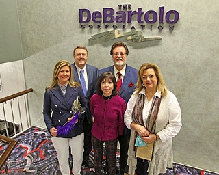 ROBERT K. YOSAY | THE VINDICATOR: 
Hospice of the Valley will host its 16th annual Mardi Gras Party on Feb. 11 at Mr. Anthony’s Banquet Center in Boardman. Preparing for the event, in front from left, are Jane Small, Denise DeBartolo-York  and Liz McGarry, and in back are Gary Small and Dr. John York.