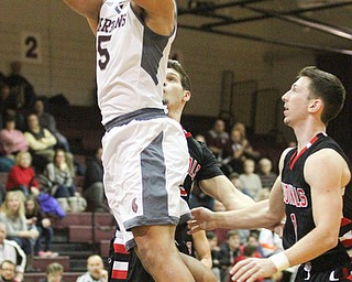 Boardman senior forward Travis Koontz(5) goes up for the jump shot during the first quarter as Canfield High School takes on Boardman High School at Boardman High School  in Boardman on Tuesday, Jan. 31, 2017. Boardman won 51-44...(Nikos Frazier | The Vindicator)..