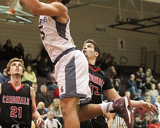 Boardman senior forward Travis Koontz(5) goes up for the jump shot during the first quarter as Canfield High School takes on Boardman High School at Boardman High School  in Boardman on Tuesday, Jan. 31, 2017. Boardman won 51-44...(Nikos Frazier | The Vindicator)..