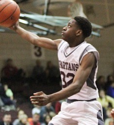 Boardman sophomore guard Che Trevena(32) goes up for the layup during the second quarter as Canfield High School takes on Boardman High School at Boardman High School  in Boardman on Tuesday, Jan. 31, 2017. Boardman won 51-44...(Nikos Frazier | The Vindicator)..