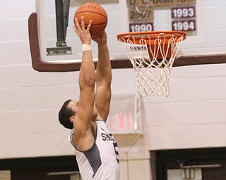 Boardman senior forward Travis Koontz(5) goes up for the dunk during the third quarter as Canfield High School takes on Boardman High School at Boardman High School  in Boardman on Tuesday, Jan. 31, 2017. Boardman won 51-44...(Nikos Frazier | The Vindicator)..