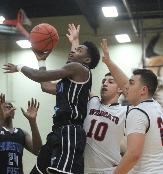 William D Lewis The Vindicator Easts Calvaughn Bryant(4) drives past Struther'sAJ Musolino(10) and Jaret Jacubec(24) during Jan. 31, 2017 action at Struthers.