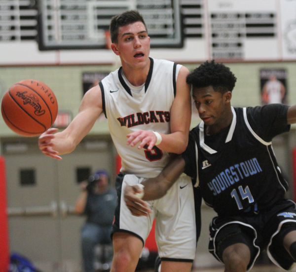 William D Lewis The Vindicator Easts Michael Ramey(14) and Struther's Andrew Carbon(5) during Jan. 31, 2017 action at Struthers.