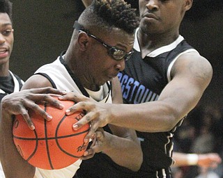 William D Lewis The Vindicator Easts Vonzell Matlock(3) and Struthers Kevin Traylor(3)go for the ball during Jan. 31, 2017 action at Struthers.