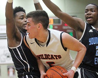 William D Lewis The Vindicator Struthres Andrew Carbon(5) is hemmed in by east;s Calvaughn Bryant(4), left, and Larry Ranson(24) during Jan. 31, 2017 action at Struthers.