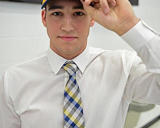 STRUTHERS, OHIO - FEBRUARY 1, 2017: A.J. Musolino wears a Kent State hat after signing his national letter of intent to play football at Kent State University, Wednesday afternoon at Struthers High School. DAVID DERMER | THE VINDICATOR