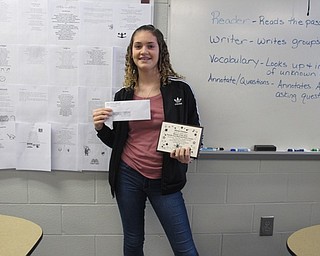 Neighbors | Alexis Bartolomucci.Alyssa Gartner, eighth-grader at Austintown Middle School, received an award on Jan. 6 for being the winner of the Danielle Scott Memorial Poetry Contest at the Public Library of Youngstown and Mahoning County.