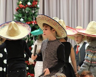 Neighbors | Abby Slanker.A second-grade Hilltop Elementary School student donned a sombrero during the singing of “The Pinata Song” at the school’s annual Holidays Around the World program on Dec. 20.