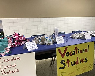 Neighbors | Alexis Bartolomucci.Tables were set up around the cafeteria showcasing the different creative organizations at Austintown Fitch High School on Jan. 13 during the Creative Arts Night.
