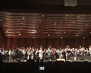 Neighbors | Alexis Bartolomucci.The sixth-grade band members stood up as they finished their performance during the Boardman Middle Schools Winter Concert on Jan. 12.