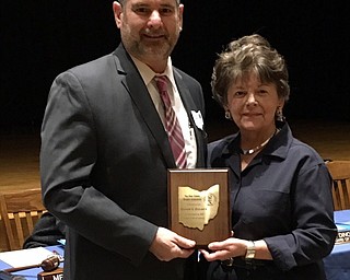 Neighbors | Submitted.OSBA Northeast Regional Mgr. Reno Contipelli presents Poland School Board V.P., Elinor Zedaker with award for 25 years of service.