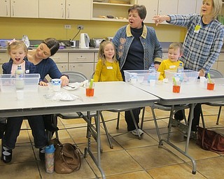 Neighbors | Alexis Bartolomucci.Guests at the Mad Science Sprout Club watched as the bubbles come out of the water bottle during an experiment at Fellows Riverside Gardens on Jan. 19.