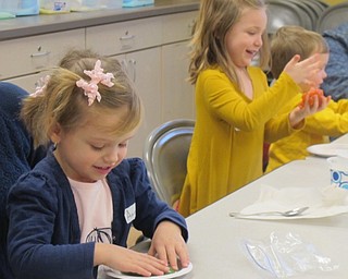 Neighbors | Alexis Bartolomucci.Children at the Mad Science Sprout Club played with slime at Fellows Riverside Gardens on Jan. 19.