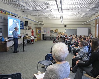 Neighbors | Alexis Bartolomucci.President of the Poland Township Historical Society, Larry Baughman, speaks to third-grade students at Dobbins Elementary on Jan. 23 about the history of Poland.