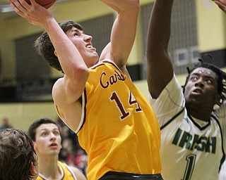 William D. Lewis The Vindicator Mooney's  Pat Brennan(14) shoots around Ursuline's Anthony Howell(1) during 2/3/17 action at Ursuline   Please check spelling. Scorers handwriting was nearly unreadable.