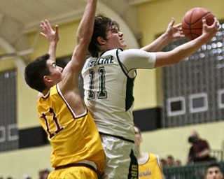 William D. Lewis The Vindicator Mooney's Anthony fire(11) defends against  Ursuline's Trace Leonard(11) during 2/3/17 action at Ursuline  Please check spelling. Scorers handwriting was nearly unreadable.