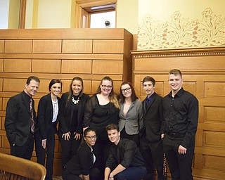 SPECIAL TO THE VINDICATOR:  

Struthers High School mock trial team recently competed in a tournament that qualified them for regional competition in Akron. There are two teams of eight that include prosecution and defense members on each team. The teams have been reviewing case law and preparing testimonies with local lawyers who have donated their time to the program. Above, students on the black team, in front from left, are Nia Daltorio and Manny Padilla. In back are adviser Rick Bruno, Kayla Greenwood, Peyton McLaughlin, Makayla Sinkovich, Brittany Heasley, Brandon Grace and Levi DeMarco. Below, on the red team, are Jenna Whited, Chris Heinrich, Kinsey Warren, Austin Fullerton, Michael Kennedy, Spencer Farkas, Steven Mraulak, Brook Scott and Matt Zanni. Struthers is the only mock trial team in Mahoning County and competes against Trumbull County schools at the district level.