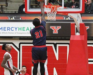 Detroit Mercy  junior forward Jaileel Hogan(21) goes up for two during the first half as Detroit Mercy University takes on Youngstown State at the Beeghly Center at Youngstown State University in Youngstown on Saturday, Feb. 4, 2017. Detroit Mercy won, 90-80...(Nikos Frazier | The Vindicator)..
