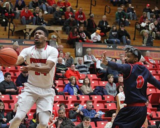 Youngstown State Penguins junior guard Cameron Morse(24) goes up for the layup during the first half as Detroit Mercy University takes on Youngstown State at the Beeghly Center at Youngstown State University in Youngstown on Saturday, Feb. 4, 2017. Detroit Mercy won, 90-80...(Nikos Frazier | The Vindicator)..