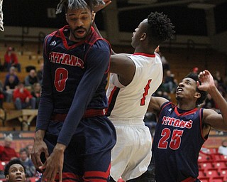 Youngstown State Penguins freshman guard Braun Hartfield(1) goes up to the net for two during the first half as Detroit Mercy University takes on Youngstown State at the Beeghly Center at Youngstown State University in Youngstown on Saturday, Feb. 4, 2017. Detroit Mercy won, 90-80...(Nikos Frazier | The Vindicator)..
