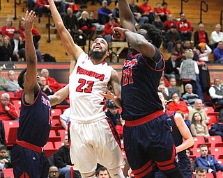 Youngstown State Penguins junior guard Francisco Santiago(23) goes up for the layup during the first half as Detroit Mercy University takes on Youngstown State at the Beeghly Center at Youngstown State University in Youngstown on Saturday, Feb. 4, 2017. Detroit Mercy won, 90-80...(Nikos Frazier | The Vindicator)..