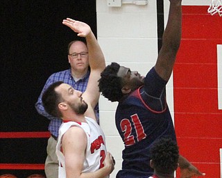 Detroit Mercy junior forward Jaleel Hogan(21) goes up for two during the first half as Detroit Mercy University takes on Youngstown State at the Beeghly Center at Youngstown State University in Youngstown on Saturday, Feb. 4, 2017. Detroit Mercy won, 90-80...(Nikos Frazier | The Vindicator)..