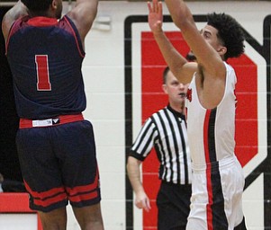 Detriot Mercy freshman guard Corey Allen(1) goes up for two against Youngstown State Penguins sophomore forward Devin Haygood(2) during the second half as Detroit Mercy University takes on Youngstown State at the Beeghly Center at Youngstown State University in Youngstown on Saturday, Feb. 4, 2017. Detroit Mercy won, 90-80...(Nikos Frazier | The Vindicator)..