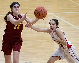 MICHAEL G TAYLOR | THE VINDICATOR- 02-04-17 -Basketball-  3rd qtr., Columbiana's #10 Grace Hammond defends against Mooney's #11 Courtney Koken.  Lady Basketball- Cardinal Mooney vs Columbiana Clippers at Columbiana High School in Richard Berryman Gymnasium, Columbiana, OH.