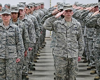 VIENNA, OHIO - FEBRUARY 4, 2017: Service men and women salute Major General John P. Stokes as he enters the hanger Saturday morning at the Air Reserve Base. DAVID DERMER | THE VINDICATOR