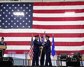 VIENNA, OHIO - FEBRUARY 4, 2017: Major General John P. Stokes passes the wing flag to Colonel Daniel J. Sarachene during the Assumption of Command Ceremony, Saturday morning at the Air Reserve Station in Vienna. DAVID DERMER | THE VINDICATOR