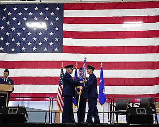 VIENNA, OHIO - FEBRUARY 4, 2017: Major General John P. Stokes passes the wing flag to Colonel Daniel J. Sarachene during the Assumption of Command Ceremony, Saturday morning at the Air Reserve Station in Vienna. DAVID DERMER | THE VINDICATOR