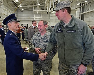 VIENNA, OHIO - FEBRUARY 4, 2017: Colonel Daniel J. Sarachene shakes hands with William Hrinko the Commander of the Civil Air Defense after being introduced by Major Brad Forrider after the Assumption of Command Ceremony, Saturday morning at the Air Reserve Station in Vienna. DAVID DERMER | THE VINDICATOR