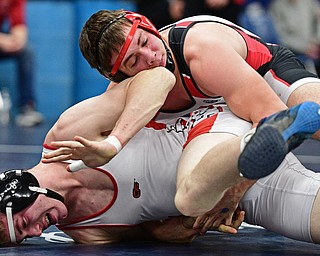 AUSTINTOWN, OHIO - FEBRYARY 4, 2017: David Crawford of Canfield controls the back of Nathan Whitehead of Columbiana during their 170lb championship bout Saturday night at Austintown Fitch High School. DAVID DERMER | THE VINDICATOR