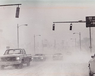 Area drivers turned on their headlights and kept a steady hand on the wheel as they drove home at the peak of the storm which dropped 3.2 inches of new snow, but caused high drifts closing many area roads. ROute 422 near Coitsville Center looked like this.