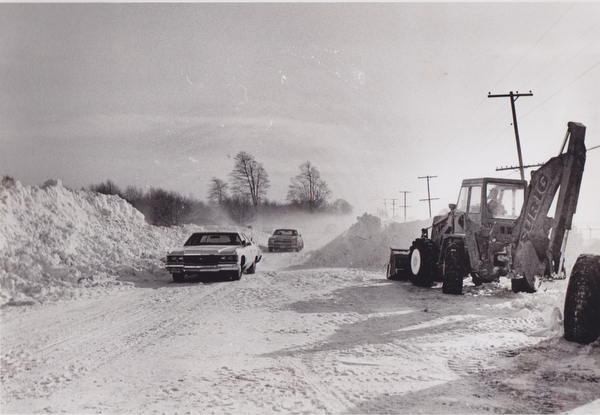 2Snow as high as an elephant's eye -- snow drifts reached heights of 12 to 14 feet along State Route 193 near the Youngstown Municipal Airport north of the city over the weekend and plows from the J.S. Durig Construction Co., Warren, were called into service to maintain traffic. The Ohio State Highway Patrol limited traffic to one lane at times using their police ratios to control traffic flow past the airport.