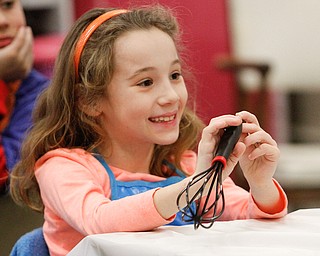        ROBERT K. YOSAY  | THE VINDICATOR..Elise Kovach   gets her whisk ready......Hot Chocolate production in Kristin Hartshorn 3rd grade class - was at peak production on thursday afternoon as packets of Hot Chocolate .  starting with ingredients and ending up in take home bags at a buck and a half ...-30-.