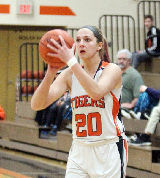 William D Lewis the vindicator  Howland's Sara Price(20) line up a three during Feb 8, 2017 win over Harding.