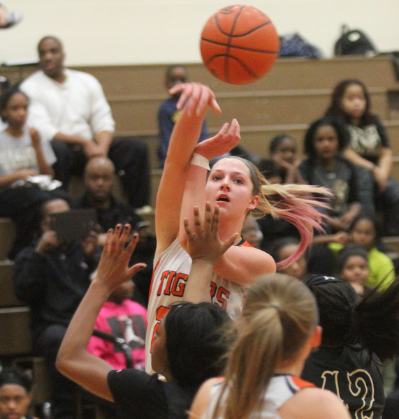 William D Lewis the vindicator  Howland's Sara Price(20) passes during Feb 8, 2017 win over Harding.