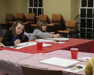 Neighbors | Alexis Bartolomucci.Children at Poland library's painting program worked on painting in their foxes on Jan. 23.