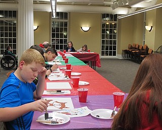 Neighbors | Alexis Bartolomucci.Children came to the Poland library on Jan. 23 to participate in the painting program led by artist Jan Luoma.