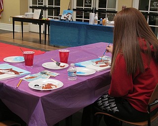Neighbors | Alexis Bartolomucci.One of the guests at the Poland library's painting program on Jan. 23 works on finishing her fox painting.