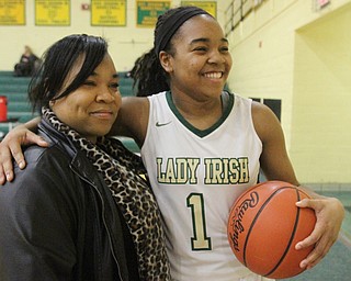 William D Lewis The vindicator Ursuline's Dayshonette Harris(1) shares a moment with her mother Royshanette Harris after scoring her 1,00th during opening moments of Feb 9, 2017 game at Ursuline.