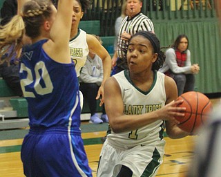 William D Lewis The vindicator Ursuline's Dayshonette Harris(1) drives past Villa MAria's Maddie Demski(20) to score her 1,00th during opening moments of Feb 9, 2017 game at Ursuline.
