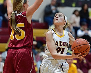 CANFIELD, OHIO - FEBRUARY 9, 2017: Samantha Patrone #21 of South Range goes to the basket while Lauren Frommelt #15 of Mooney during the second half of their game Thursday night at South Range High School. DAVID DERMER | THE VINDICATOR