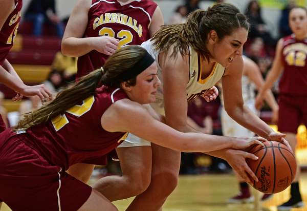 CANFIELD, OHIO - FEBRUARY 9, 2017: Taylor Naples #23 of South Range and Taylor Martin #12 of Mooney battle for the loose ball during the second half of their game Thursday night at South Range High School. DAVID DERMER | THE VINDICATOR