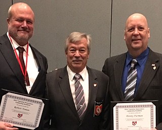 
Robert Toman, a trustee of Ellsworth Township, and Denny Furman, a trustee of Berlin Township, recently graduated from the Ohio Township Association Leadership Academy, a local government training program. The academy was founded in 2003 to educate elected officials, city staff and employees to develop their decision-making skills while serving in local government positions. Participants must graduate within three years and complete six of the ten courses offered, attend the academy’s general workshop, and either the National Association of Towns and Townships annual conference in Washington D.C. or the OTA Federal Day Workshop in Blacklick, Ohio. Toman and Furman were elected in 2013. Toman, left, and Furman, right, received their diplomas from Tom Willsey, president of OTA.

SPECIAL TO THE VINDICATOR