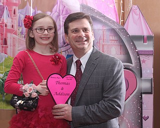 Thomas Ring and his daughter Addison(7) smile for a photo at the Daddy and Daughter Princess Dance at Lariccia Family Community Center in Boardman Park in Boardman on Saturday, Feb. 11, 2017. ..(Nikos Frazier | The Vindicator)..